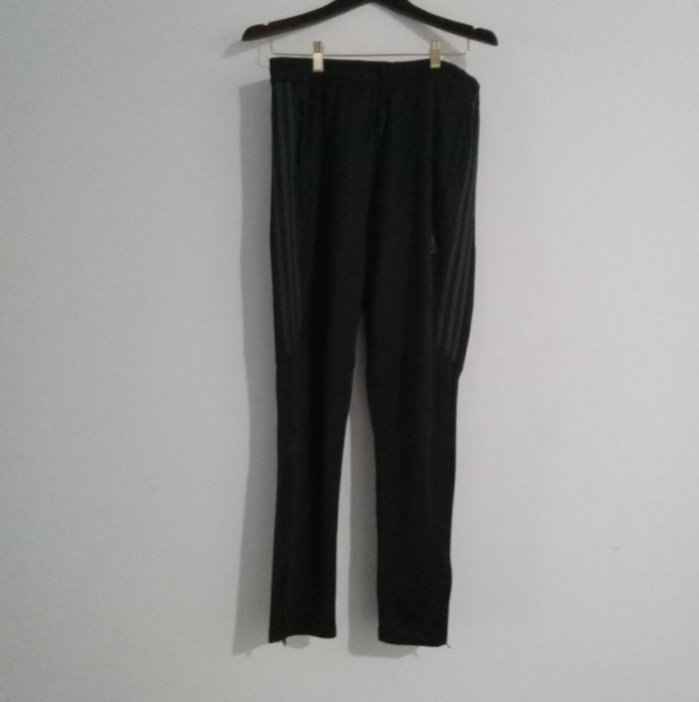 Black on black Adidas Tiro soccer pants..tapered legs w/zippers..size large.